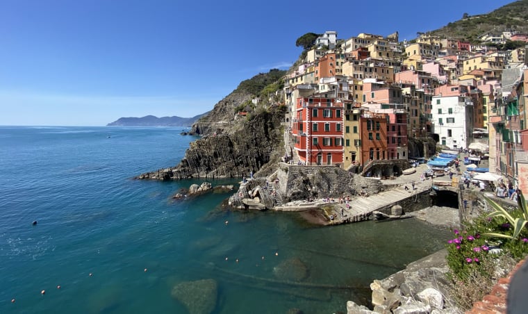Colorful buildings on a seaside coast in Italy.
